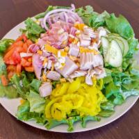 Chef's Salad · Chopped turkey, Ham, Cheddar Cheese, Jack cheese over green leaf lettuce with tomato, pepper...