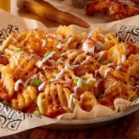 Loaded Waffle Fries · DWG’s famous waffle fries. Fried golden crisp, drizzled with sour cream, topped with shredde...