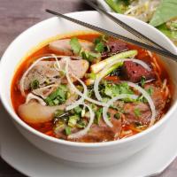 P4. Pho Dac Biet House Special · House special combo pho: filet mignon, brisket, fatty brisket, flank, tendon, tripe and beef...