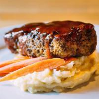 38 Meatloaf · Sirloin/Brisket meatloaf, yukon gold mashed potatoes, sauteed carrot, sweet and spicy tomato...