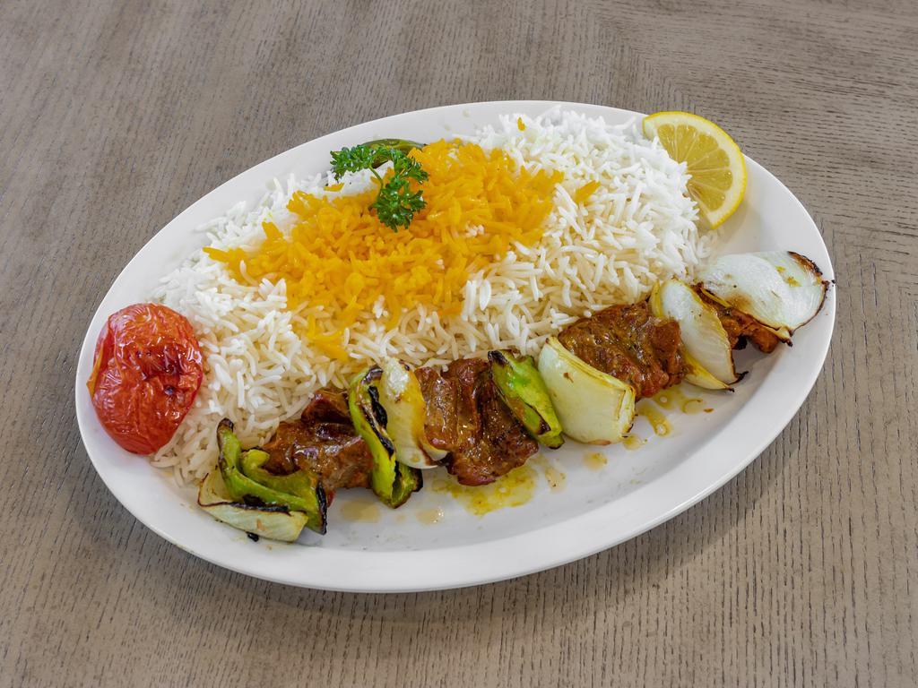 3. Shish Kabab  · Grilled beef chunks kabab served with grilled tomato and basmati rice.