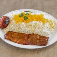 4. Barg Kabab  · Grilled filet mignon kabab served with grilled tomato and basmati rice.