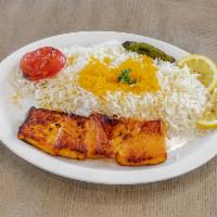 5. Salmon Kabab  · Salmon fish fillet grilled to perfection served with grilled tomato and basmati rice.