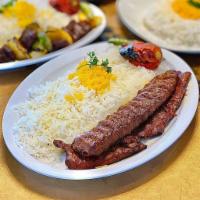 6. Sultani Kabab  · Grilled filet mignon and ground beef kabab served with grilled tomato and basmati rice.