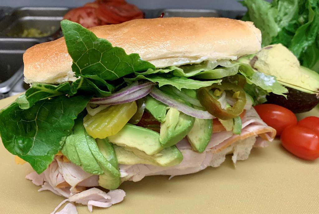 3. Roast Turkey and Avocado Sandwich · mayonnaise, mustard, lettuce, tomato, and pickles and red onions.