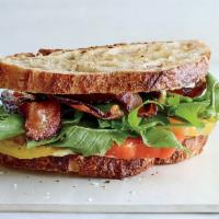 12. BLTA · Bacon, avocado, mayonnaise, tomatoes, and lettuce.