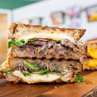 Short rib Grilled Cheese · Beef short rib braised in house, Swiss, pickled onions, chipotle aioli,arugula pressed