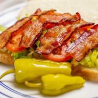 The BLT · Tasty bacon strips, lettuce and tomato, with mayo, lettuce, tomato, salt, pepper and oregano.