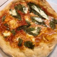 Napoli Pizza · San Marzano tomato sauce, olive oil, fresh basil, Parmesan and mozzarella.
