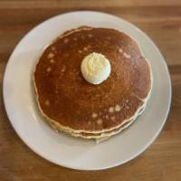 the buttermilk pancake stack · stack of 3 buttermilk pancakes | whipped butter + syrup