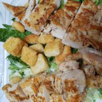 Chicken Caesar Salad · Croutons, Parmesan cheese and Caesar dressing.