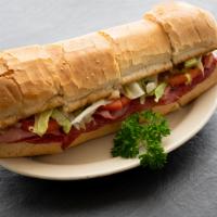 Big Sir Sub · Baked ham, salami, cheese, onion garnished with lettuce, tomato and mayonnaise.