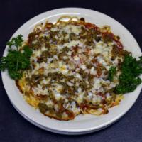 Baked Royal Feast Spaghetti · Pepperoni, sausage, mushrooms, onions, red and green peppers, tomato sauce, spaghetti, garli...