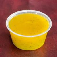 Cup of Dill Butter Sauce · Our famous Dill Butter sauce