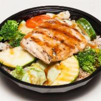 Large Salmon Teriyaki Bowl · Made to order and served over a bed of rice with fresh wok-stirred veggies and Sam's famous ...