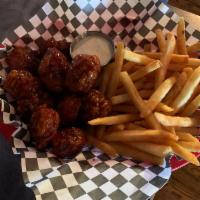 8 Boneless Chicken Wings · 8 wings served with your choice of homemade potato chips, fries or celery sticks. Ranch dres...