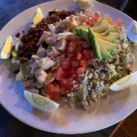 Farmers Market Cobb · Grilled chicken, tomatoes, bleu cheese crumbles, red onions, egg, avocado and bacon. Served ...