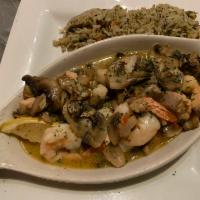 Seafood Saute · Prawns, salmon, Alaskan cod, bay scallops and fresh mushrooms sauteed in a white wine butter...