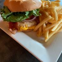 Farm Burger · Bacon, American cheese, tomatoes, crisp lettuce, red onions and mayo topped with a farm fres...