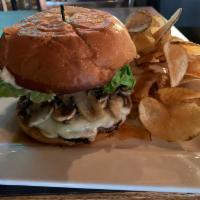 Mushroom Burger · Loaded with sauteed mushrooms and topped with Swiss cheese, tomatoes, crisp lettuce, red oni...