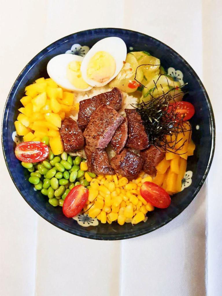 P14. Black Pepper Beef Bowl · Include kimchi cucumber, egg, oshinko, sweet corn, edamame, cherry tomato, roasted seaweed.