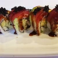 S9. Red Dragon Roll · Eel, cucumber topped with tuna, avocado, eel sauce, and tobiko. Raw.