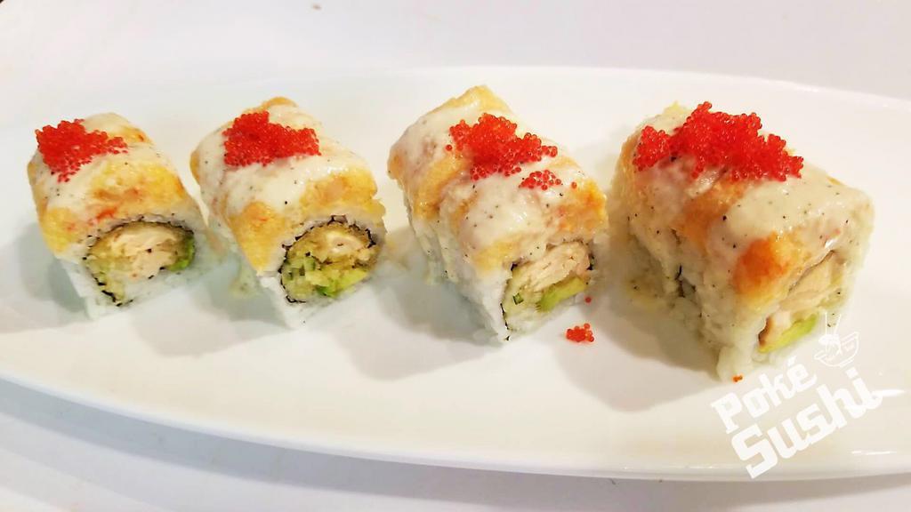 S21. Lobster Kings Roll · Salmon tempura, avocado, cucumber topped with spicy crunchy lobster, and eel sauce. Spicy.