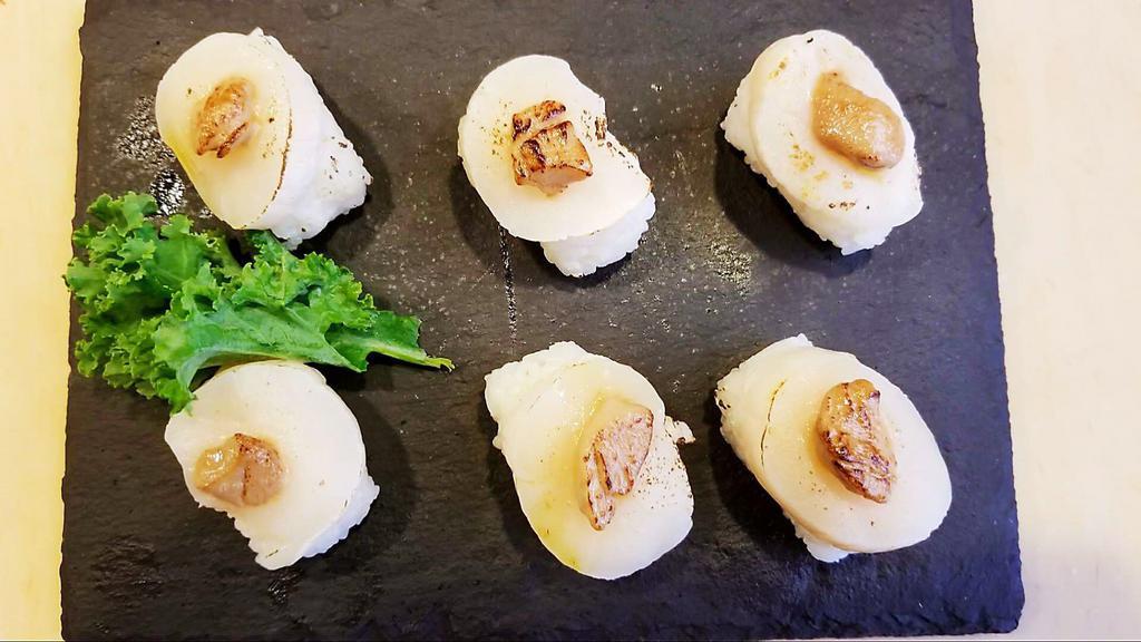 U10. Special Scallop Sushi · Scallop, mousse of duck foie gras and truffle sauce.
