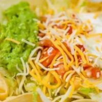 Shrimp Taco Salad · Includes Oscar's secret sauce. Served with rice, lettuce, tomato, guacamole, and cheese. Tac...