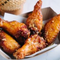 13. Crispy Zaap Wings · Savory chicken wings topped with fried garlic.