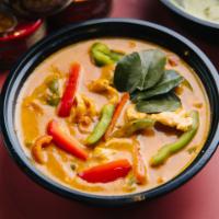 19. Panang Curry · Creamy panang curry with kafir lime leaves and bell peppers. Served with jasmine rice.