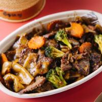 22. Pad See Ew | Sweet Soy Sauce Noodles · Thick rice noodles with egg, carrots, broccoli, white pepper.