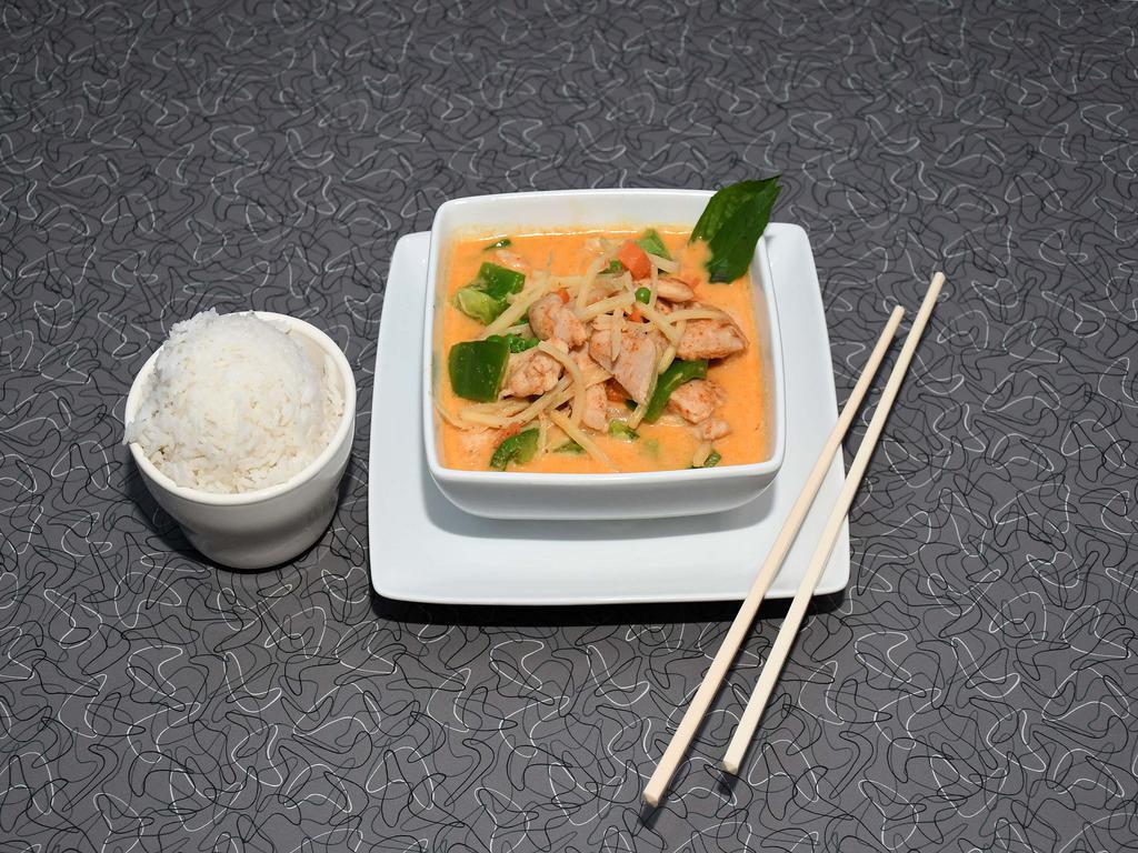 Panang Curry · Bell peppers, bamboo shoots, basil, peas and carrots. Includes a side of white rice. For fried rice, please add to order in 