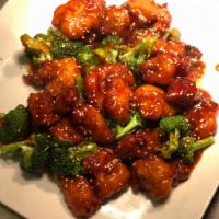 Sesame Chicken · Breaded chicken with broccoli and topped with sesame seeds. Includes a side of white rice. F...