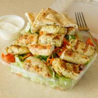 Chicken Kebab Salad · Asian, teriyaki, honey BBQ or Buffalo. Extra flavors are for an additional charge.