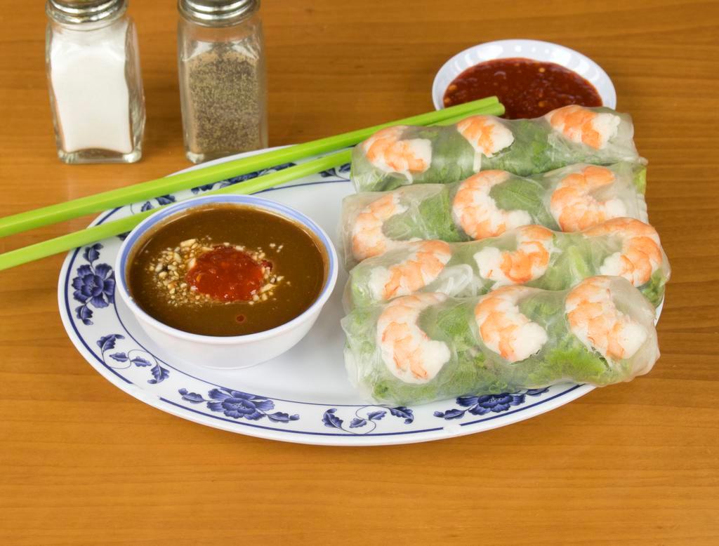 25. Spring Roll · 4 rolls. Goii cuoan 4 cuoan. Shrimp, pork, beansprouts, mint, lettuce, chive and vermicelli. Wrapped in rice paper served with peanut sauce.