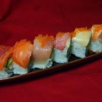 Rainbow Roll · Assorted fishes and tobiko over California roll.
