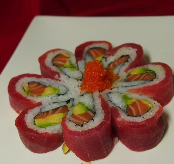 Cherry Blossom Roll · Salmon and avocado topped with tuna and tobiko.
