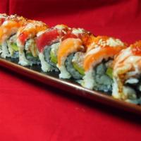 Mercy Roll · Crab meat and avocado topped with salmon, tuna, tobiko and Joy special sauce.