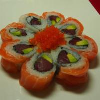 Paul Blossom Roll · Tuna, avocado topped with salmon with tobiko.