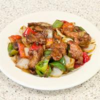 P11. Pepper Steak · Beef, green bell pepper, red bell pepper and white onion in brown sauce. Served with choice ...