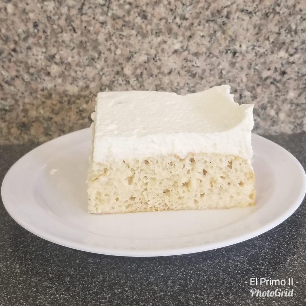 Homemade Tres Leche · Baked in house, sweet cake soaked in three kinds of milk: evaporated milk, condensed milk, and heavy cream. Topped with fresh made lightly sweetened whipped cream.
