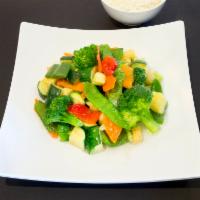 16v. Vegetables Delight · Fresh broccoli, snow peas, carrots, water chestnuts and mushroom in light sauce. Served with...