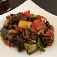 41b. Beef Pepper Steak · Beef and onion and bellpepper. Served with choice of rice.