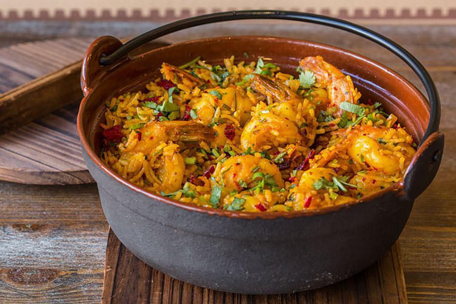 Shrimp Biryani · Flavored basmati rice, whole spices and garden herbs.