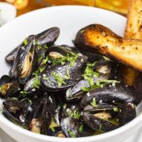 Moules Marinières Frites ou Salade Dinner · Steamed mussels with garlic, shallots, parsley, lemon and white wine broth. Served with fren...
