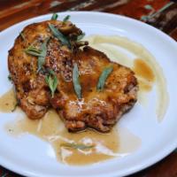 Poulet Roti a L'estragon · Free-range roasted chicken with tarragon sauce served with Yukon gold mashed potatoes and st...