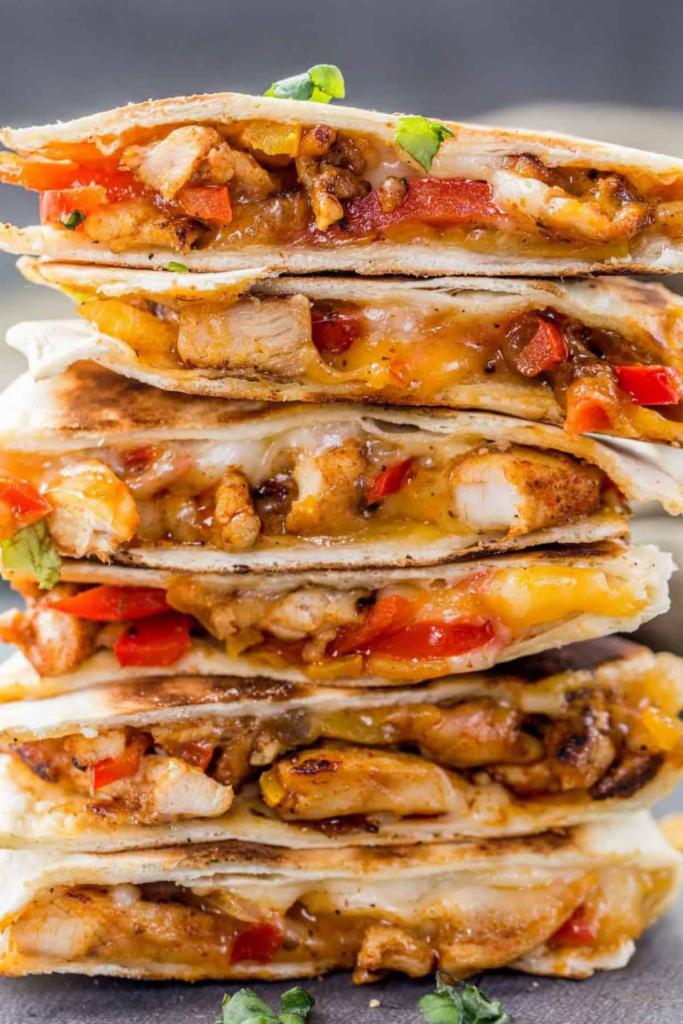 Chicken Fajita Quesadilla · Cubed chicken breast with bell peppers, onions and mushrooms. Served with sour cream and guacamole.