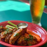 6 buffalo wings  · freshly made from scratch buffalo wings drenched in hot fire sauce made from our chefs, serv...