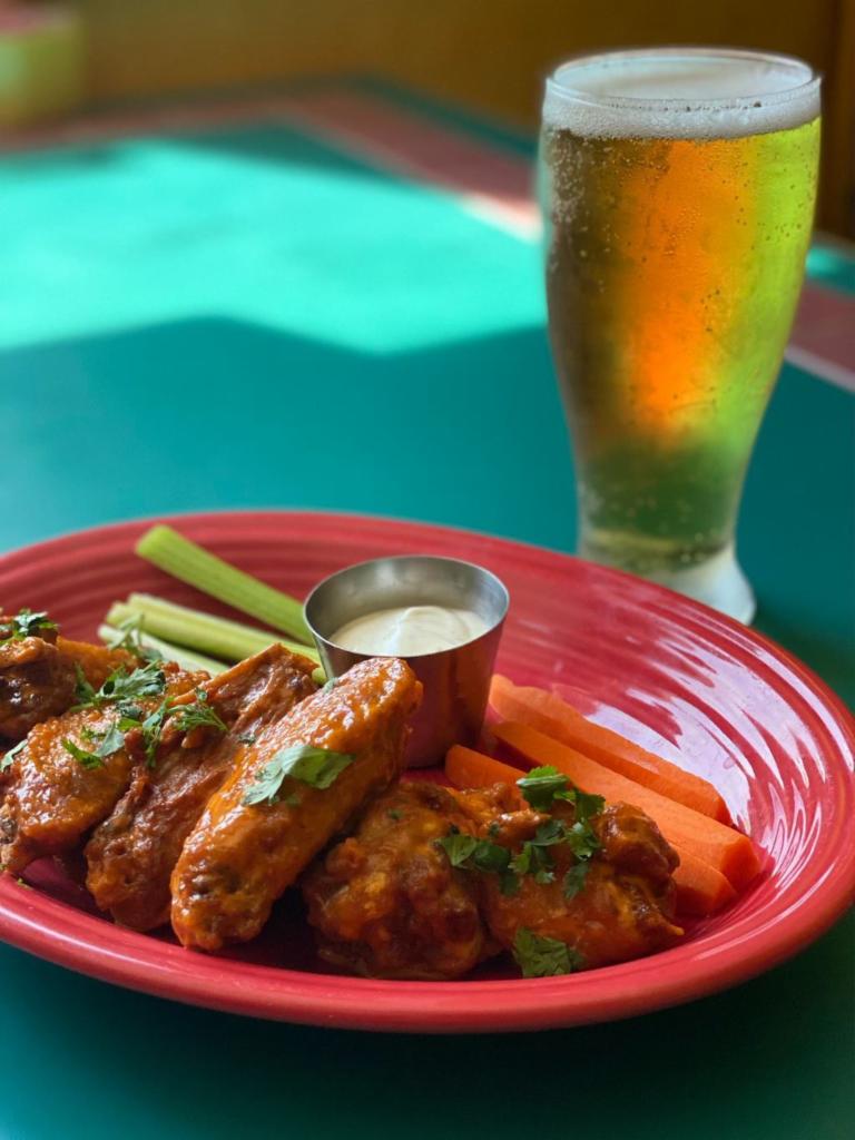 6 buffalo wings  · freshly made from scratch buffalo wings drenched in hot fire sauce made from our chefs, served with ranch celery and carrots 
